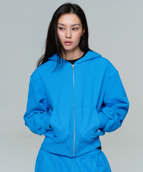 ERA(エラ)の「UNISEX ERA OVERSIZED HOODED ZIP-UP - CAPRI BLUE(パーカー・レディース・ライトブルー・LARGE/MEDIUM/SMALL)」の7枚目の写真