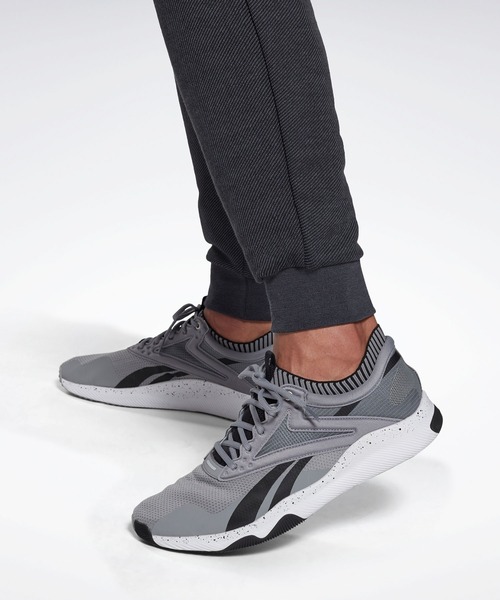 Reebok(リーボック)の「トレーニング エッセンシャルズ メランジ ジョガー / Training Essentials Melange Joggers(スウェットパンツ・メンズ・ブラック/ヘザーグレー・XXX-LARGE/LARGE/MEDIUM/X-LARGE/SMALL/XX-LARGE/X-SMALL)」の13枚目の写真