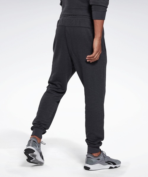 Reebok(リーボック)の「トレーニング エッセンシャルズ メランジ ジョガー / Training Essentials Melange Joggers(スウェットパンツ・メンズ・ブラック/ヘザーグレー・XXX-LARGE/LARGE/MEDIUM/X-LARGE/SMALL/XX-LARGE/X-SMALL)」の6枚目の写真