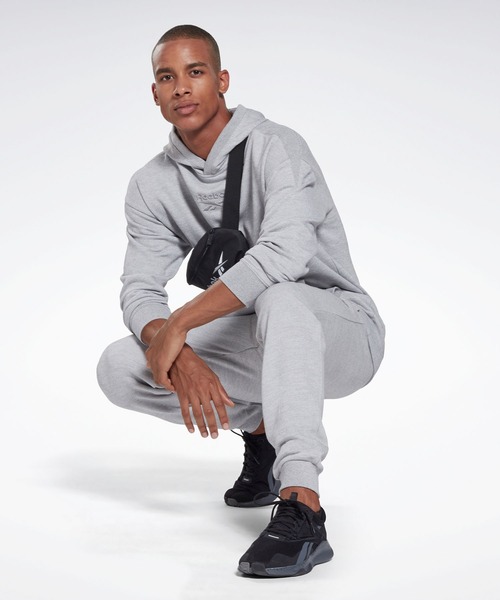 Reebok(リーボック)の「トレーニング エッセンシャルズ メランジ ジョガー / Training Essentials Melange Joggers(スウェットパンツ・メンズ・ブラック/ヘザーグレー・XXX-LARGE/LARGE/MEDIUM/X-LARGE/SMALL/XX-LARGE/X-SMALL)」の5枚目の写真