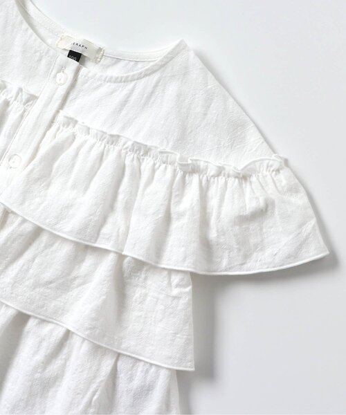 Seraph(セラフ)の「羽織にもなる前あきフリルブラウス_ジュニア対応(シャツ/ブラウス・キッズ・オフホワイト/アイボリー/ブラック・140/130/120/110/100/90/80)」の10枚目の写真