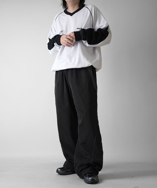 Confirm(コンファーム)の「Y2K 切替パイピングサイドライン 裾ドローコード ナイロンワイドパンツ ユニセックス【Confirm】(その他パンツ・メンズ・ホワイト/ブラック/グレー・M/L)」の14枚目の写真