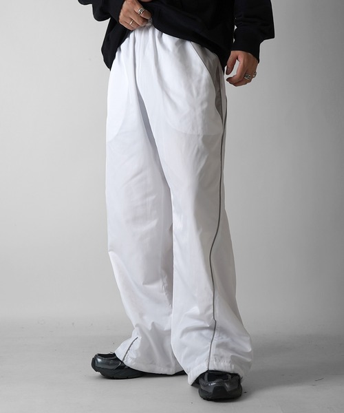 Confirm(コンファーム)の「Y2K 切替パイピングサイドライン 裾ドローコード ナイロンワイドパンツ ユニセックス【Confirm】(その他パンツ・メンズ・ホワイト/ブラック/グレー・M/L)」の7枚目の写真