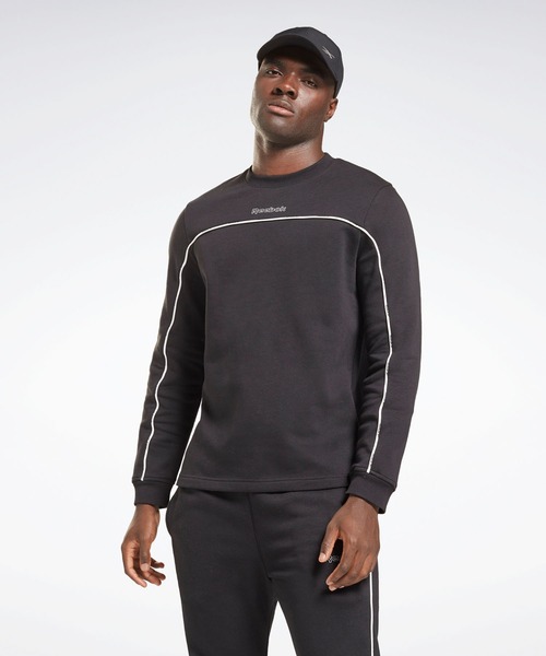 Reebok(リーボック)の「トレーニング エッセンシャルズ パイピング クルー スウェットシャツ / Training Essentials Piping Crew Sweatshirt(スウェット・メンズ・ブラック/ネイビー・X-SMALL/XXX-LARGE/LARGE/MEDIUM/X-LARGE/SMALL/XX-LARGE)」の1枚目の写真
