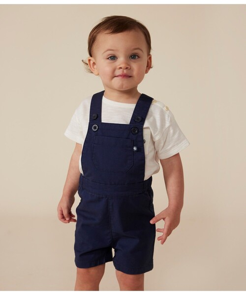 PETIT BATEAU(プチバトー)の「ショートサロペット(サロペット/オーバーオール・キッズ・ネイビー・12MONTH/18MONTH/24MONTH/36MONTH)」の1枚目の写真