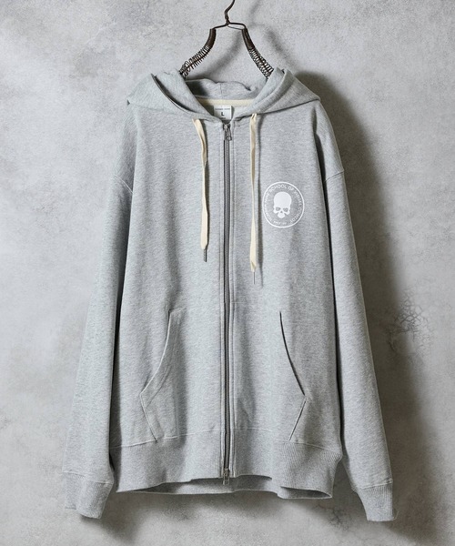 NUMBER (N)INE（ナンバーナイン）の「SCHOOL OF VISUAL COMEDY PRINTED FULL ZIP SWEAT HOODIE / スカルモチーフ ワンポイントロゴ & バックプリント スウェット ジップパーカー（パーカー・メンズ・トップグレー/ブラック・M/L/XL）」の14枚目の写真