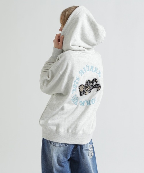 AVIREX(アヴィレックス)の「SAGARA CIRCLE LOGO TOMCAT ZIP PARKA(パーカー・レディース・ブラック/オートミール/パープル・F)」の16枚目の写真