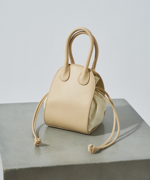 Chico（チコ）の「ラウンドコンビ巾着ショルダーバッグ（ショルダーバッグ・レディース・ベージュ/アイボリー/ブラック・FREE）」の2枚目の写真