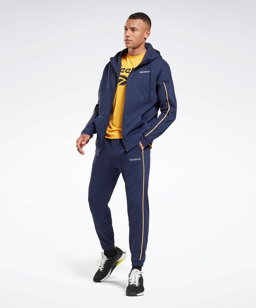 Reebok（リーボック）の「トレーニング エッセンシャルズ パイピング ジョガーズ / Training Essentials Piping Joggers（スウェットパンツ・メンズ・ブラック/ネイビー・XXX-LARGE/MEDIUM/LARGE/X-LARGE/SMALL/XX-LARGE/X-SMALL）」の11枚目の写真
