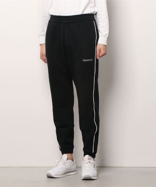 Reebok（リーボック）の「トレーニング エッセンシャルズ パイピング ジョガーズ / Training Essentials Piping Joggers（スウェットパンツ・メンズ・ブラック/ネイビー・XXX-LARGE/MEDIUM/LARGE/X-LARGE/SMALL/XX-LARGE/X-SMALL）」の13枚目の写真