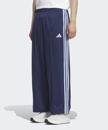 adidas（アディダス）の「スタジアム トリコット ルーズフィット ストレート レッグ パンツ   アディダス adidas（スウェットパンツ）」