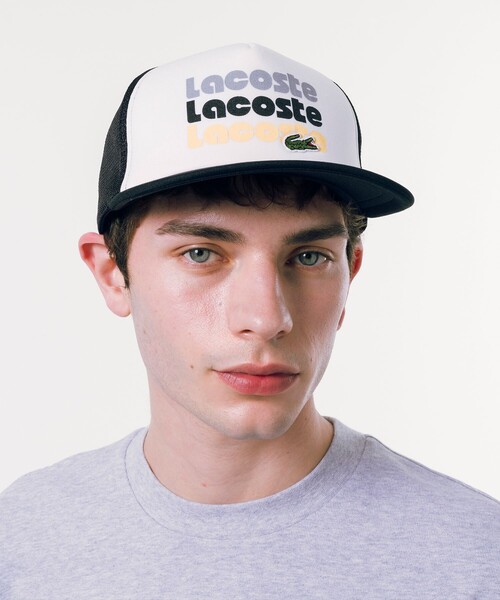LACOSTE(ラコステ)の「リピートロゴメッシュキャップ(キャップ・メンズ・ブラック/ロイヤルブルー・58cm)」の2枚目の写真