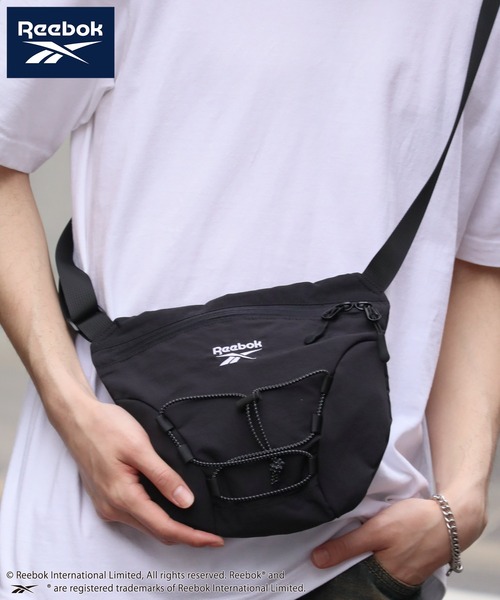 Reebok(リーボック)の「【Reebok/リーボック】ナイロンドローコードミニボディバッグ(ボディバッグ/ウエストポーチ・メンズ・チャコールグレー/ブラック/グレイッシュベージュ・FREE)」の1枚目の写真