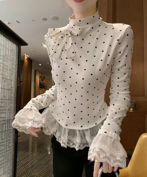 Ritzy(リッツィー)の「ドット柄 リボン&裾レース ハイネック長袖トップス(Tシャツ/カットソー・レディース・ホワイト/ブラック・FREE)」の5枚目の写真
