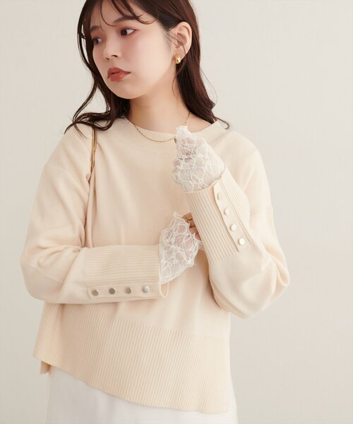 natural couture(ナチュラルクチュール)の「スタンドネック袖口釦ゆるニット(ニット/セーター・レディース・アイボリー/グリーン/サックスブルー/ピンク/モカ/ボルドー/ブラック系その他/ホワイト系その他・FREE)」の1枚目の写真