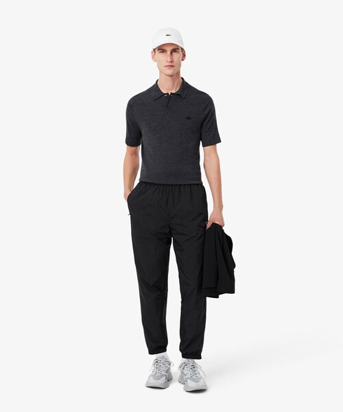 LACOSTE（ラコステ）の「ワッシャー加工 ナイロン 軽量撥水トラックパンツ（その他パンツ・メンズ・グレイッシュブルー/ブラック・3/2/5/4）」の5枚目の写真