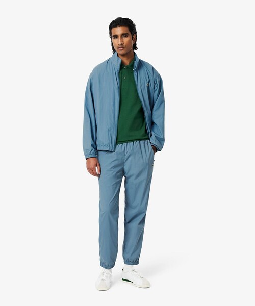 LACOSTE（ラコステ）の「ワッシャー加工 ナイロン 軽量撥水トラックパンツ（その他パンツ・メンズ・グレイッシュブルー/ブラック・3/2/5/4）」の6枚目の写真