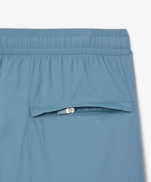 LACOSTE（ラコステ）の「ワッシャー加工 ナイロン 軽量撥水トラックパンツ（その他パンツ・メンズ・グレイッシュブルー/ブラック・3/2/5/4）」の12枚目の写真