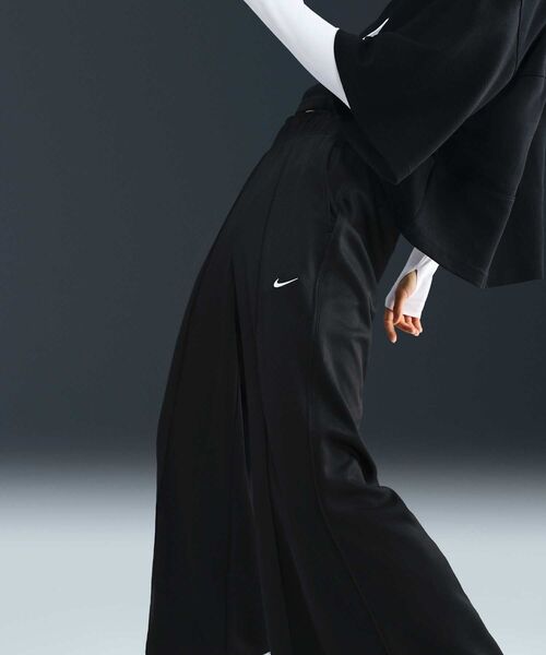 NIKE（ナイキ）の「ナイキ スポーツウェア ウィメンズ ミッドライズ ワイドレッグ トラックパンツ / Nike Sportswear Women's Mid-Rise Wide-Leg Track Pants IH8515-010 Black（その他パンツ・レディース・ブラック・XL/M/L/XS/S）」の18枚目の写真