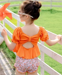 TeddyShop（テディショップ）の「【キッズ水着/裏地付き】半袖 バック リボン カットアウト パフスリーブ リブ ペプラムトップス+フリルショーツ+スイムキャップ 上下3点セット（水着）」