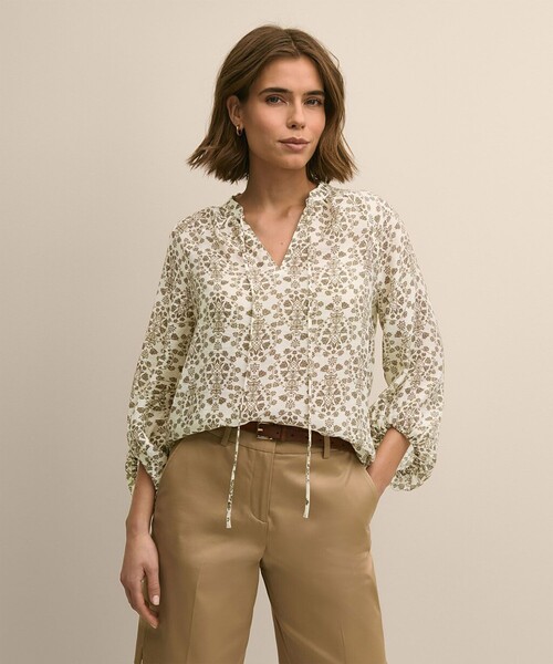 BROOKS BROTHERS(ブルックスブラザーズ)の「リヨセル/ナイロン フローラルプリント バルーンスリーブ タイネック プルオーバーブラウス(シャツ/ブラウス・レディース・ベージュ・LARGE/MEDIUM/X-SMALL)」の1枚目の写真