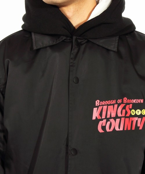 ８(eight)（エイト）の「ロゴ コーチジャケット バックプリント（ナイロンジャケット・メンズ・ブラック/カーキ・MEDIUM/LARGE）」の9枚目の写真