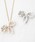 TOCCA�i�g�b�J�j�́uRIBBON BROOCH NECKLACE �u���[�`�l�b�N���X�i�u���[�`/�R�T�[�W���j�v�b�S�[���h�n