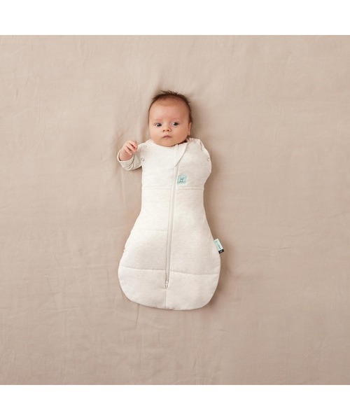 ergoPouch（エルゴポーチ）の「ergoPouch/コクーンスワドルバッグ 2.5TOG 新生児から寝返りが始まった赤ちゃん用 夜泣き対策（おくるみ・キッズ・ホワイト系その他/オートミール/ベビーピンク/ライトブルー・6MONTH/12MONTH/NewBorn/3MONTH）」の8枚目の写真