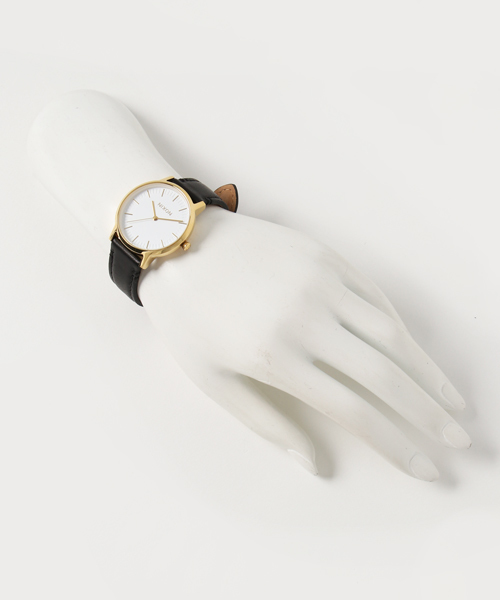 NIXON(ニクソン)の「THE PORTER 35 LEATHER NA11992523-00 GOLD/BLACK JPN(アナログ腕時計・レディース・ブラック×ゴールド・FREE)」の5枚目の写真