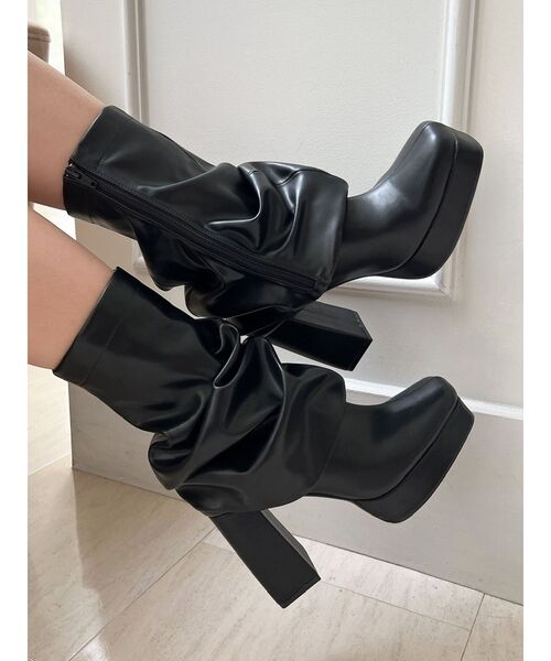 RESEXXY（リゼクシー）の「2WAYレッグウォーマーブーツ（ブーツ・レディース・アイボリー/ブラック・SMALL/LARGE/MEDIUM）」の2枚目の写真