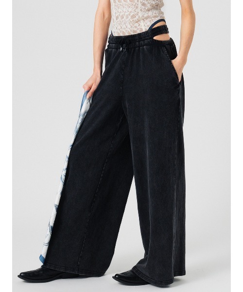 ELCHELE(エルチェレ)の「PIGMENT WAIST SLIT PANTS(スウェットパンツ・レディース・ベージュ/スミクロ・38/36)」の1枚目の写真