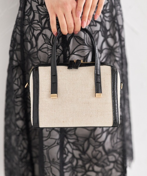 tocco closet(トッコ クローゼット)の「2WAYショルダー付き異素材バッグ(ボストンバッグ・レディース・アイボリー/ブラック・FREE)」の10枚目の写真