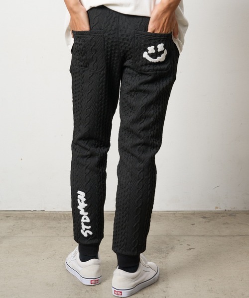 STUD MUFFIN（スタッドマフィン）の「STUD MUFFIN/スタッドマフィン/ケーブルジャガードダブルフェイス サガラ刺繍 リブパンツ（その他パンツ・メンズ・ブラック・3）」の3枚目の写真