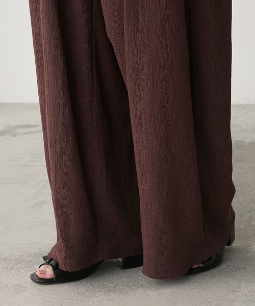 forksy.（フォルクシー）の「【forksy.】ミニフリル切替えシャーリング バックリボン オールインワン（つなぎ/オールインワン・レディース・ブラック/ブラウン・FREE）」の8枚目の写真