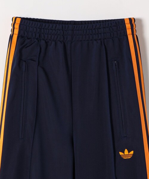 adidas(アディダス)の「adidas:〈洗濯機可能〉アディカラー クラシック ファイヤーバード ルーズ トラック パンツ(その他パンツ・レディース・ネイビー・X-SMALL)」の5枚目の写真