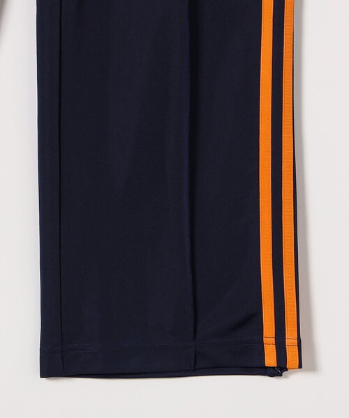 adidas(アディダス)の「adidas:〈洗濯機可能〉アディカラー クラシック ファイヤーバード ルーズ トラック パンツ(その他パンツ・レディース・ネイビー・X-SMALL)」の7枚目の写真