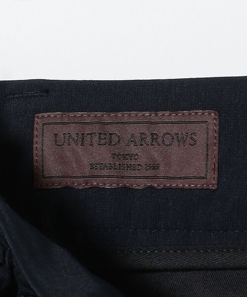 UNITED ARROWS(ユナイテッドアローズ)の「ポンチ スリムテーパード サイドシャーリング イージースラックス-ストレッチー(スラックス・メンズ・ネイビー・50/48/46/42)」の16枚目の写真
