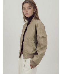 ACUD（アクド）の「Glossy Bomber Jacket _Beige（MA-1）」