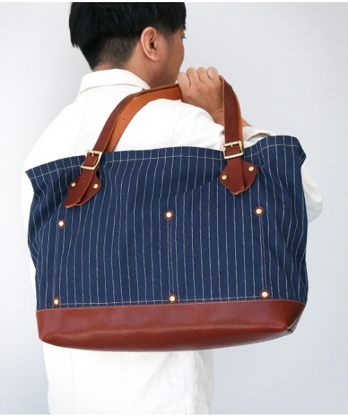 JAPAN BLUE JEANS(ジャパンブルージーンズ)の「デニム×レザーハンドル トラベルトートバッグ(トートバッグ・メンズ・ストライプ・FREE)」の1枚目の写真
