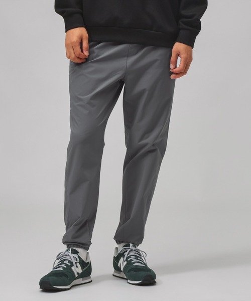 NEW BALANCE(ニューバランス)の「【別注】ニューバランス New Balance ウーブンパンツ 限定コラボ(その他パンツ・メンズ・ブラック/グレー・M/S/L/LL/3L)」の1枚目の写真