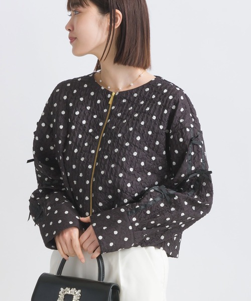 PICCIN(ピッチン)の「サッカードット袖リボンジャケット(ノーカラージャケット・レディース・オフホワイト/ブラック・M)」の1枚目の写真