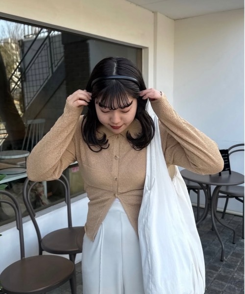 lawgy(ラウジー)の「pattern compact sleeve hole knit / パターンコンパクトスリーブホールニット(ニット/セーター・レディース・ブラックミックス/ライトオレンジ系/アイボリー・FREE)」の7枚目の写真