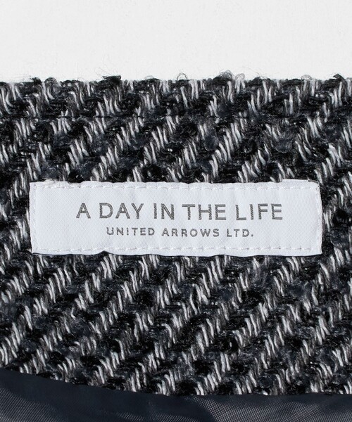 A DAY IN THE LIFE UNITED ARROWS(アデイインザライフユナイテッドアローズ)の「ブークレ ツイードライク フリンジ ラップスカート<A DAY IN THE LIFE>(スカート・レディース・ブラウン系/ロイヤルブルー/ダークグレー・M/S)」の5枚目の写真