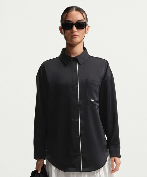NIKE(ナイキ)の「NIKE AS W NSW OFFLN WVN STN LS TOP IM0576(その他アウター・レディース・ブラック/オリーブ・S/M)」の1枚目の写真