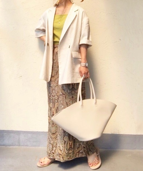 NEUNA(ヌナ)の「【4WAY】【紐調節可能】【刺繍巾着バッグ付き】扇形ヴィーガンレザーショルダーハンドバッグ(ショルダーバッグ・レディース・ブラック/アイボリー・FREE)」の16枚目の写真