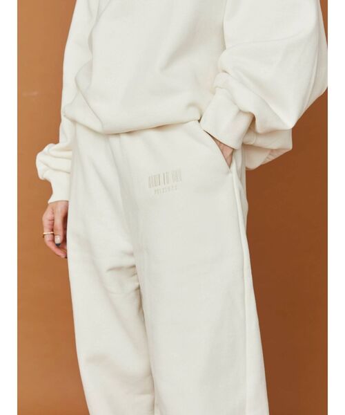 EVRIS（エヴリス）の「スウェットルーズパンツ【セットアップ着用可能】（スウェットパンツ・レディース・ブラック/ホワイト・FREE）」の3枚目の写真