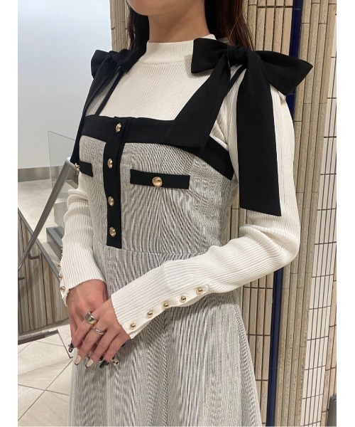 AND COUTURE(アンドクチュール)の「袖ボタンハイネックリブプルオーバー(ニット/セーター・レディース・オフホワイト/ブラック/ラベンダー/オレンジ・FREE)」の7枚目の写真