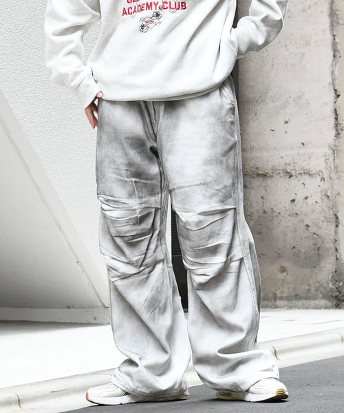 Starting Over(スターティングオーバー)の「vintage like spray Discharge printing loose fit denim pants/ヴィンテージ ライク スプレー 抜染加工 ルーズフィット デニムパンツ(デニムパンツ・メンズ・ブラック系その他/ブラック/ホワイト・M/L)」の2枚目の写真