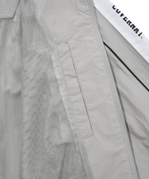 COVERNAT（カバーナット）の「レトロトラックジャケットグレー（ナイロンジャケット・レディース・その他・X-LARGE/LARGE/MEDIUM/SMALL）」の8枚目の写真