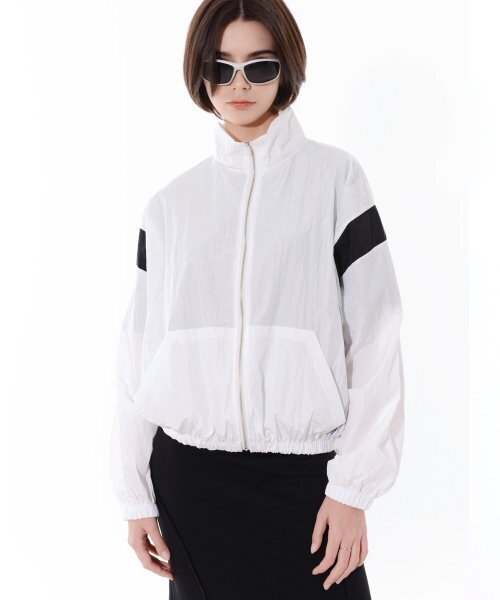 PIECEMAKER(ピースメーカー)の「SHIMMERING NYLON TRACK JACKET (IVORY)(ナイロンジャケット・レディース・その他・FREE)」の1枚目の写真